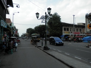 Malioboro road. One of the main streets in town,  thronged with tourist shops, stalls, cyclos and horse carriages. 